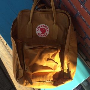 Mustard 13 inch Fjallraven Kanken backpack